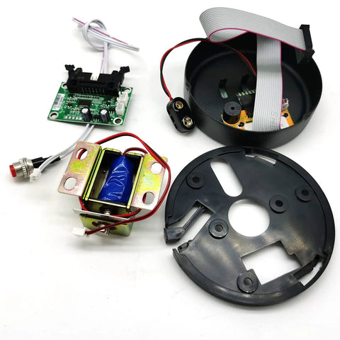 Drop In This Heavy Duty Electronic Gun Safe Replacement Lock With Slick Black Matte Zinc Shell Anti Shake Mechanism One To Eight Digit Programmable Codes Dual Access Groups Triple Led Status Lights Built Tough For Easy Setup electronic components including circuit board and metal housing.