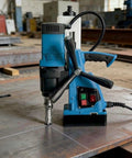 Beefy Magnetic Drill Press With Variable Speed, Portable Core Drilling Machine for Steel Plates and Hollow Sections, 1580W, Industrial and Home Use, Handheld on steel plate.