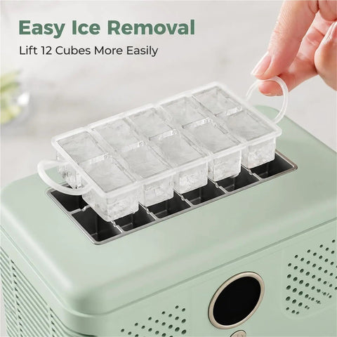 Sleek Countertop Ice Maker With Zero Sweat One Touch Operation And Smooth Self Cleaning Design Blazing Fast Cube Production For Weekend Hangouts Home Bars Or Office Chill Areas Ultra Compact, showing easy ice removal with a tray holding 12 ice cubes.