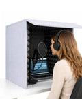 Zero Bull Foldable Soundproof Box Portable Vocal Booth For Home Studio Recording That Cuts Room Echo Dead And Serves Straight Up Crisp Audio With Quick Pop Up Desk Setup Wherever You Roll, with user, microphone and laptop.