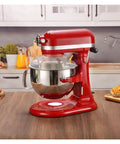 Pouring Cover Splash Guard For KitchenAid Bowl Lift Stand Mixers 5.5Qt Through 8Qt installed on red mixer in kitchen
