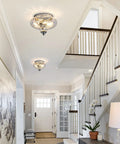 Modern Two Light Hammered Glass Flush Mount Ceiling Light In Chrome Finish in hallway setting, 10.2 inch diameter.