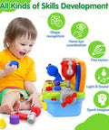 Toddler playing with Musical Toddler Tool Bench Set For One Year Olds, Montessori Educational Play Kit with lights, sounds, tools.