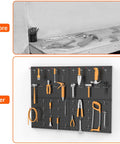 Before and after installation of Four Piece Twelve By Sixteen Inch Metal Pegboard Panels for garage organization.