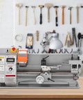Real Deal 7 X 16 Inch Benchtop Metal Lathe With 800W Brushless Direct Drive Motor and seamless variable speed displayed in a workshop.