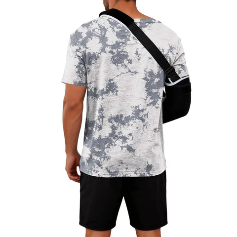 Man wearing Shoulder Surgery Shirt For Men With Easy Snap Front And Side Openings, hospital gown alternative, camo design