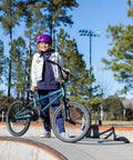 Child at skate park with Tony Hawk 720 20 Inch BMX Bike Built For Speed And Durability, Perfect For Kids And Teens Learning Tricks