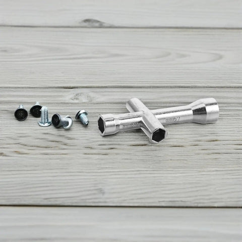 Pocket Sized Cross Socket Wrench for RC models and robot repairs with M2 M2.5 M3 M4 nuts and micro hex screws on wooden surface