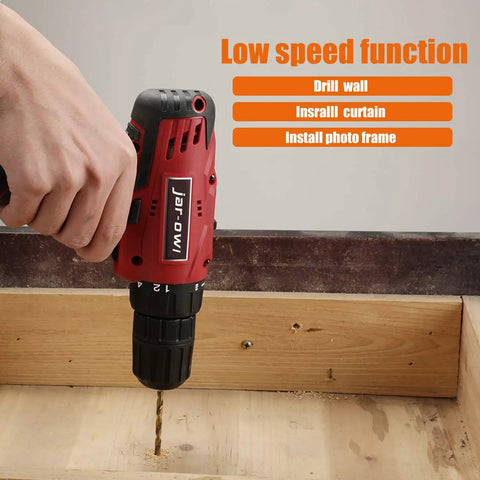 Hand holding red cordless drill from 108 Piece Cordless Tool Kit Set With Sixteen Point Eight Volt Drill LED Work Light And DIY Hand Tools For Home Garden And Office Repairs Pro Grade All In One Home Maintenance Kit Black Red, drilling into wood.