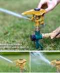Heavy Duty Pulsating Impact Sprinkler With Spike Base, All Metal Construction Built To Last, 360 Degree Adjustable Spray Pattern For Large Lawns And Yards, Covers Up To 5800 Sq Ft being adjusted by hand