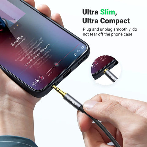 Premium 3.5 Mm Aux Extension Cable Three Pole Trs Headphone Extender Cord 3.3 Feet connected to smartphone for audio.