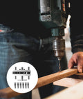 Close-up of a drill using Self Centering Dowel Drilling Locator Jig With Six Hardened Steel Bushings for precise woodwork.