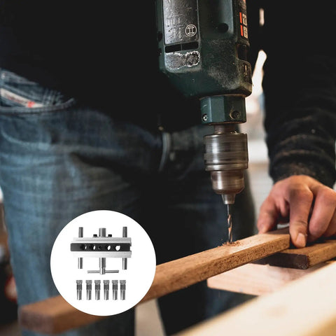 Top Shelf Self Centering Doweling Jig And Sharp Wood Drill Guide With Rugged Steel Bushings For No Sweat Setup and Killer Alignment on Any DIY Cabinetry Build, being used to drill a wooden plank.