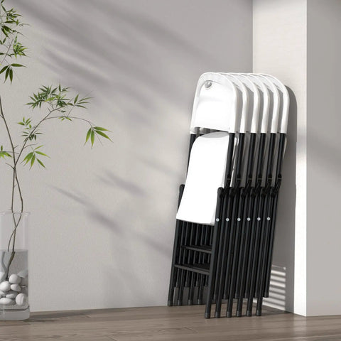 Stack of Built Tough 350 Pound Weight Capacity Plastic Folding Chairs With Reinforced Steel Frame in indoor setting
