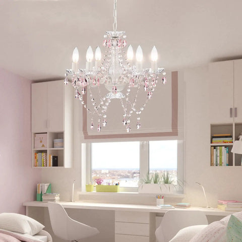 White Crystal Chandelier With Pink Droplets And Strands 6 Light Candle Style Ceiling Fixture For Bedroom Or Dining Vintage Glam Lighting With Elegant Scroll Arm Frame hanging in a bedroom with modern decor.