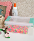 12 Pack Clip Box Stackable Clear Plastic Storage Bins With Latching Lids for organizing small items, shown with craft supplies.
