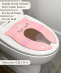 Foldable Travel Potty Seat For Toddlers Featuring A No Pinch Silicone Grip And Slick Non Slip Base Comes With A Pink Unicorn Bag on toilet, measuring 10.25 x 14 in.