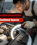 A mechanic uses a 30 Inch Bendable LED Flashlight Stick With Rechargeable Battery High Lumen Mechanic Light In 3 Modes For Tight Spaces Car Repairs Inspections Engine Bay Garage Projects to illuminate a car engine bay.