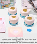Durable Metal Hole Punch For Paper Crafting DIY Embossing Punches with various shapes on a crafting table