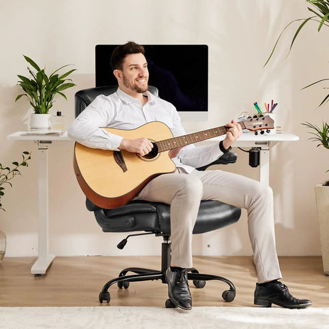 Man playing guitar on Ergonomic High Back Gaming Chair With Smooth Wheels For Long Hours Heavy Duty Desk Office Chair