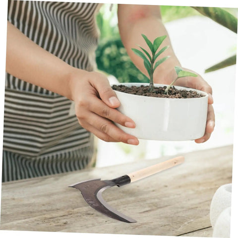 Multipurpose Manganese Weeding Scythe With Comfortable Handle Durable Garden Tool on table near potted plant