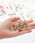 Locking Pin Backs For Pins 10 Pack Heavy Duty Metal Pin Back Keepers Clips With Spring Loaded Locking Clasp displayed on hand