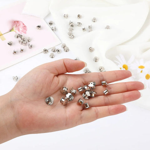 Locking Pin Backs For Pins 10 Pack Heavy Duty Metal Pin Back Keepers Clips With Spring Loaded Locking Clasp displayed on hand