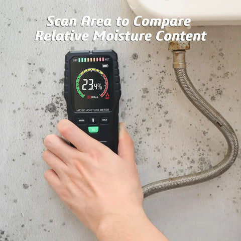 Hand using Pinless Moisture Meter Noninvasive Digital Wood Moisture Tester Water Leak Detector For Walls Lumber Firewood