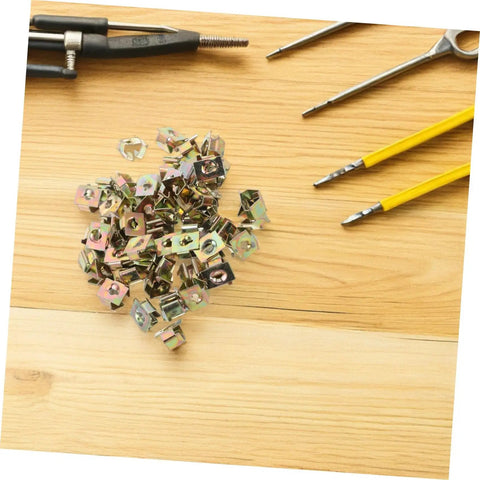 50 Piece Top Shelf Heavy Duty U Nut Fasteners Golden Captive Clips for Car Bumper and Grille Mounting on wooden surface.