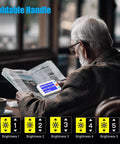 Elderly man using Must Have Portable Digital Magnifier Reading Aid With Foldable Handle 5.0 Inch LCD Screen 4X To 32X Zoom.
