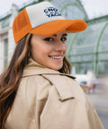 Woman wearing Lightweight Yacht Style Hat For Women With Front Artwork Adjustable Buckle Fit Breathable Summer Cap in city
