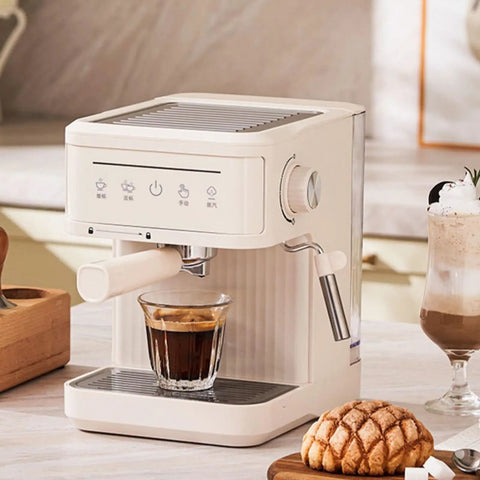 Professional Semi Automatic Espresso Machine With 15 Bar Pressure And Integrated Milk Frother brewing espresso shot in glass.