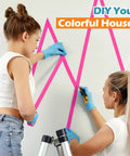 Two women using 10 Roll Gaffers Tape Kit 1 Inch By 20 Yards Heavy Duty Neon Fluorescent UV Blacklight Reactive Multipurpose Tape For Party Decor Floor Markings Stage Setup And Craft Projects on wall.
