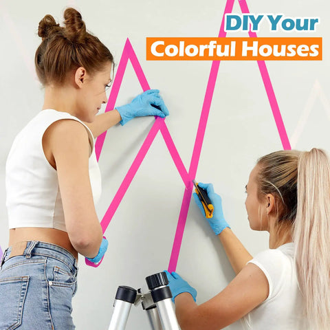 Two women using 10 Roll Gaffers Tape Kit 1 Inch By 20 Yards Heavy Duty Neon Fluorescent UV Blacklight Reactive Multipurpose Tape For Party Decor Floor Markings Stage Setup And Craft Projects on wall.