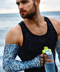Man wearing 15 Pairs Unisex Arm Sleeves With UV Protection And Anti Slip Ice Silk Fabric For Running Cycling Driving And Outdoor Sports