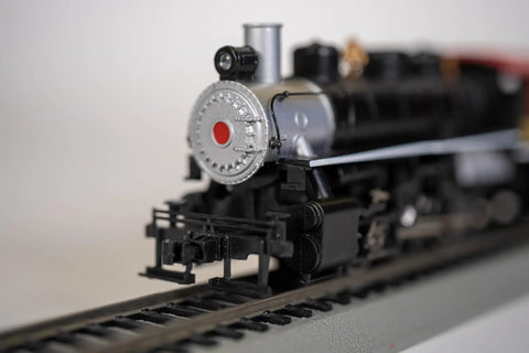Front view of USRA 0-6-0 Steam Locomotive With Smoke And Short Haul Tender NC And St Louis 152 HO Scale Loco on track