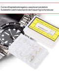 Watch Push Button Washer Set With 12 Sizes Metal Watch Repair Tool Kit In Plastic Storage Box next to wristwatch