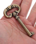Old School Antique Clock Hardware Kit With Door Key Hinges And Cylinder For DIY Grandfather Clock Restoration key in hand