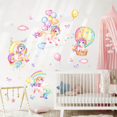 Whimsical Rainbow Unicorn Wall Decals Set With Balloons, Moon, Clouds And Stars for nursery decor on white wall above crib