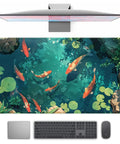 Blue Waters Desk Pad For Gaming And Work, Mega Extra Large 31.5 By 15.7 Inches with koi fish design, under laptop and keyboard.