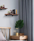 Heavy Duty Black Iron Pipe Shelf Brackets 6 Pack 13 Point 7 Inch Vintage Wall Mount DIY Shelving with decor in bedroom