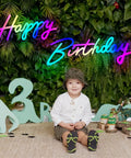 Extra Large Neon Happy Birthday Sign With Multi Color LED Lights Light Up Backdrop For Parties lit in jungle theme