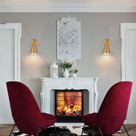 Gold Brass Wall Sconces Set Of 2 With Dope Adjustable Swing Arm Lamps and Metal Shades above a fireplace in a stylish living room.