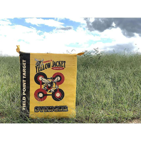 Yellow Jacket Stinger Field Point Archery Target Bag with dual sides and ten bullseyes in a grassy outdoor setting.