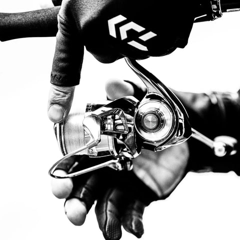 Exist G LT Spinning Reel Black Built Tough Like A Beast With Smooth Retrieve showing close-up of aluminum body and gears