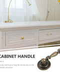 Vintage Cabinet Knobs With Sturdy Heavy Duty Drawer Pulls For Dressers And Interior Doors Hella Durable Hardware For An Instant Room Glow Up Easy Mount Two Pack on a white dresser.