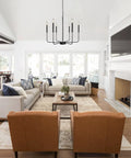 Living room with Black Farmhouse Chandelier With 6 Lights, 26.1 Inch Wide Adjustable Height Rustic Hanging Light Fixture in modern setting