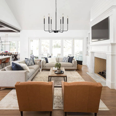 Living room with Black Farmhouse Chandelier With 6 Lights, 26.1 Inch Wide Adjustable Height Rustic Hanging Light Fixture in modern setting