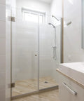 Heavy Duty 304 Stainless Steel Glass Shower Door Hinges For 6 To 12Mm Frameless Glass Door 90 Degree Pair in a modern bathroom.