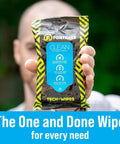 Person holding a pack of On The Go Tech Wipes Pack Of 3, 25 Count Each, Travel Size Skin Safe Clean For Screens Phones Keyboards Monitors TVs